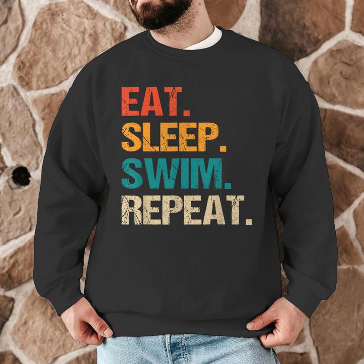 Eat Sleep Swim Repeat Pool Swimmer Water Polo Swimming Men Graphic Sweatshirt Eat Sleep Swim Repeat Pool Swimmer Water Polo Swimming Men Graphic Sweatshirt