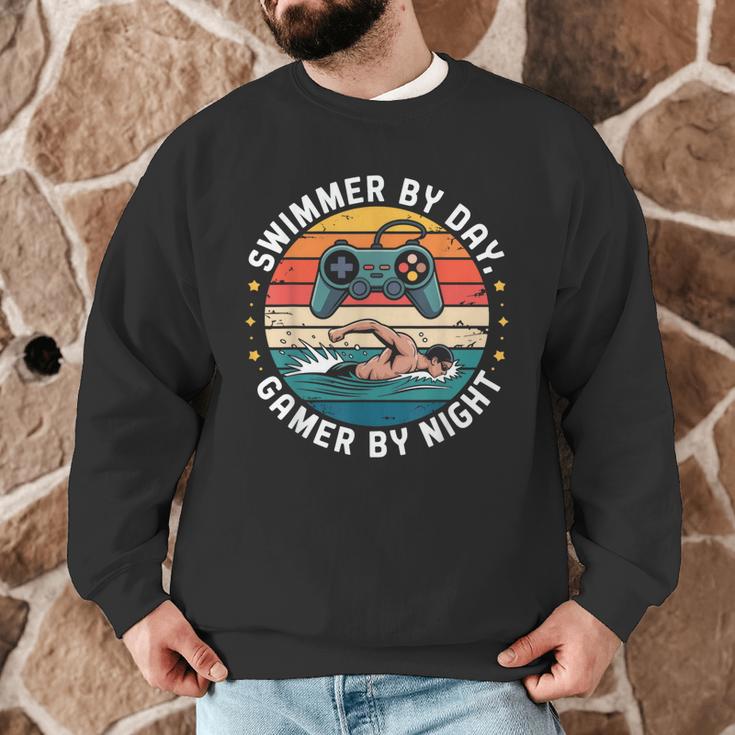 Swimmer By Day Gamer By Night Swimming Vintage Gaming Swim Men Graphic Sweatshirt Swimmer By Day Gamer By Night Swimming Vintage Gaming Swim Men Graphic Sweatshirt