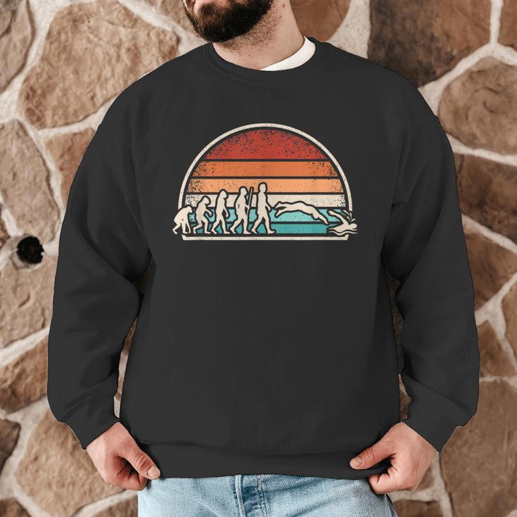 Swimming Evolution Retro Swim Swimmer Men Women Men Graphic Sweatshirt Swimming Evolution Retro Swim Swimmer Men Women Men Graphic Sweatshirt