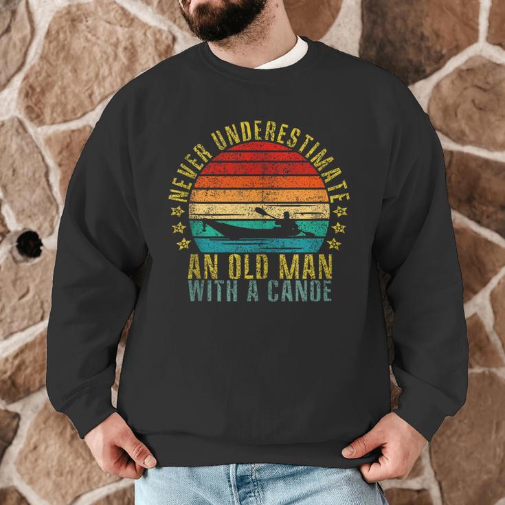 Never Underestimate An Old Man With a Canoe Retro Sleeveless Men Graphic Sweatshirt Never Underestimate An Old Man With a Canoe Retro Sleeveless Men Graphic Sweatshirt