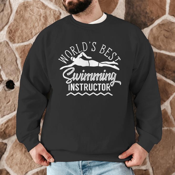 World's Best Swimming Instructor Teacher Coach Swim Men Women Kids Men Graphic Sweatshirt World's Best Swimming Instructor Teacher Coach Swim Men Women Kids Men Graphic Sweatshirt