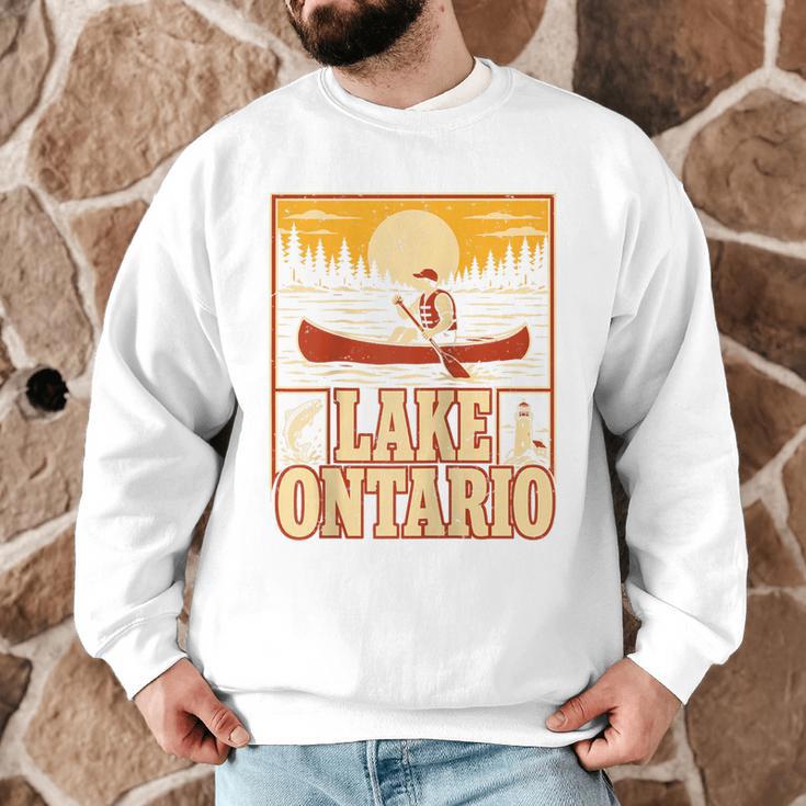 Lake Ontario Canoe Fishing Light House Sunset Retro Raglan Baseball Tee Men Graphic Sweatshirt Lake Ontario Canoe Fishing Light House Sunset Retro Raglan Baseball Tee Men Graphic Sweatshirt