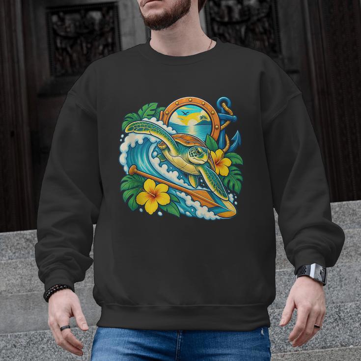 Green Sea Turtle Surfs Past a Canoe Paddle Sleeveless Men Graphic Sweatshirt