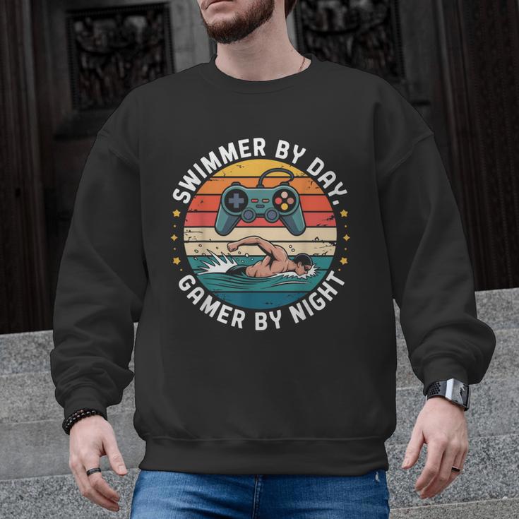 Swimmer By Day Gamer By Night Swimming Vintage Gaming Swim Men Graphic Sweatshirt, trending gift Swimmer By Day Gamer By Night Swimming Vintage Gaming Swim Men Graphic Sweatshirt, trending gift