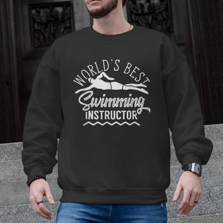 World's Best Swimming Instructor Teacher Coach Swim Men Women Kids Men Graphic Sweatshirt