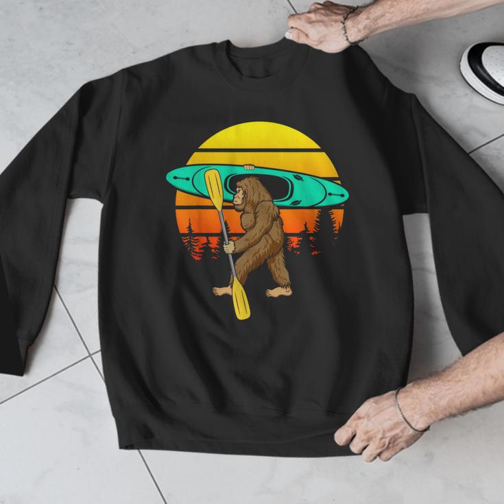 Bigfoot Kayak Paddling Lake Rafts Inflatable Canoe Sasquatch Men Graphic Sweatshirt Bigfoot Kayak Paddling Lake Rafts Inflatable Canoe Sasquatch Men Graphic Sweatshirt