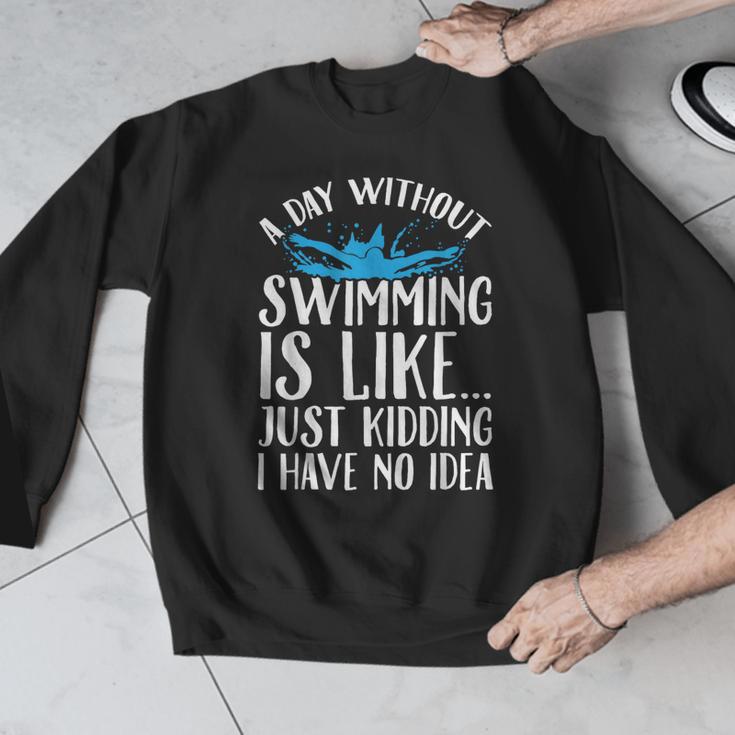 A Day Without Swimming Is Like Swimming Swimmer T-Shirt Men Graphic Sweatshirt A Day Without Swimming Is Like Swimming Swimmer T-Shirt Men Graphic Sweatshirt