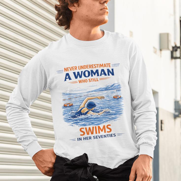 Swimming Never Underestimate A Woman Swim In Her Seventies Unisex Long Sleeve T-Shirt