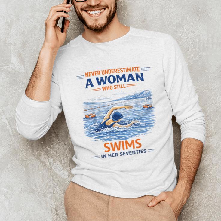 Swimming Never Underestimate A Woman Swim In Her Seventies Unisex Long Sleeve T-Shirt
