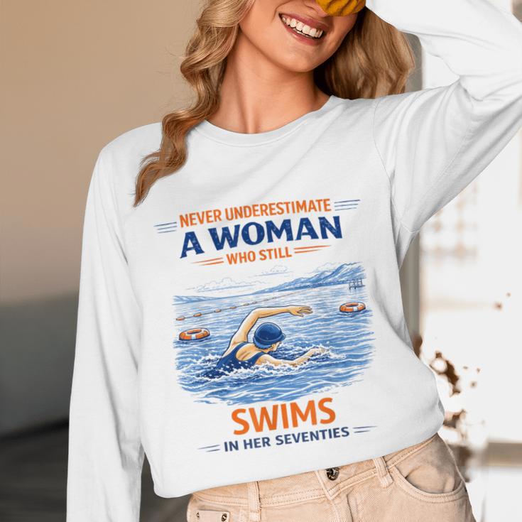 Swimming Never Underestimate A Woman Swim In Her Seventies Unisex Long Sleeve T-Shirt