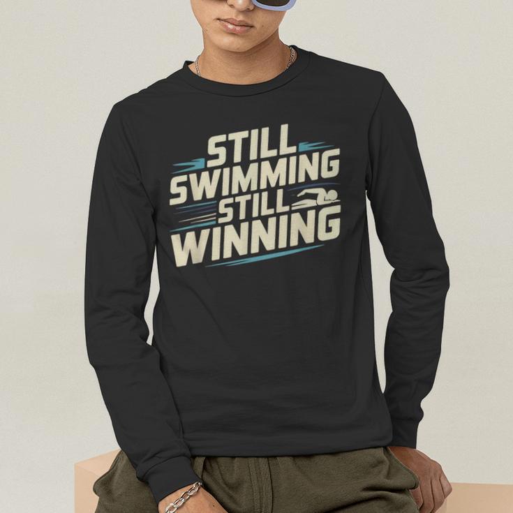 Masters Swimmer Still Swimming Competing Winning Adult Men's Long Sleeve T-Shirt Masters Swimmer Still Swimming Competing Winning Adult Men's Long Sleeve T-Shirt