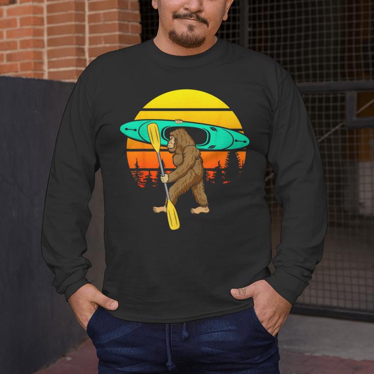 Bigfoot Kayak Paddling Lake Rafts Inflatable Canoe Sasquatch Men's Long Sleeve T-Shirt Bigfoot Kayak Paddling Lake Rafts Inflatable Canoe Sasquatch Men's Long Sleeve T-Shirt