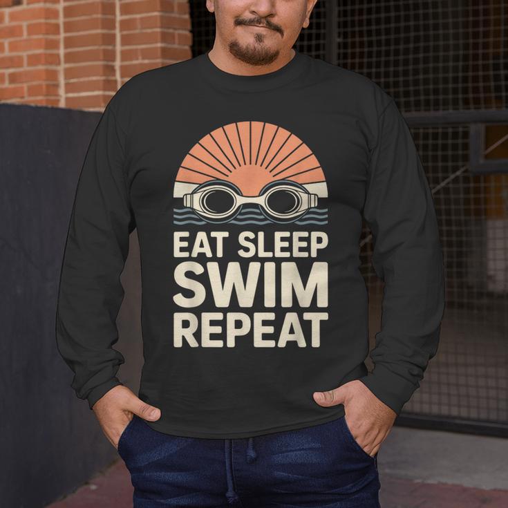 Eat Sleep Swim Repeat Swimmer Swimming Men's Long Sleeve T-Shirt Eat Sleep Swim Repeat Swimmer Swimming Men's Long Sleeve T-Shirt