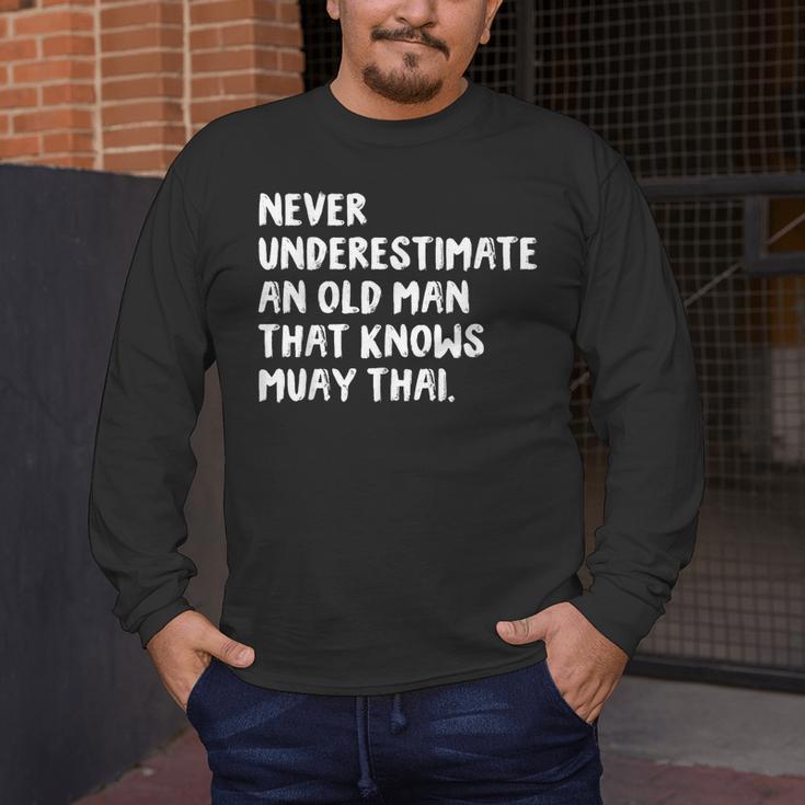 Never Underestimate An Old Man That Knows Muay Thai Men's Long Sleeve T-Shirt Never Underestimate An Old Man That Knows Muay Thai Men's Long Sleeve T-Shirt