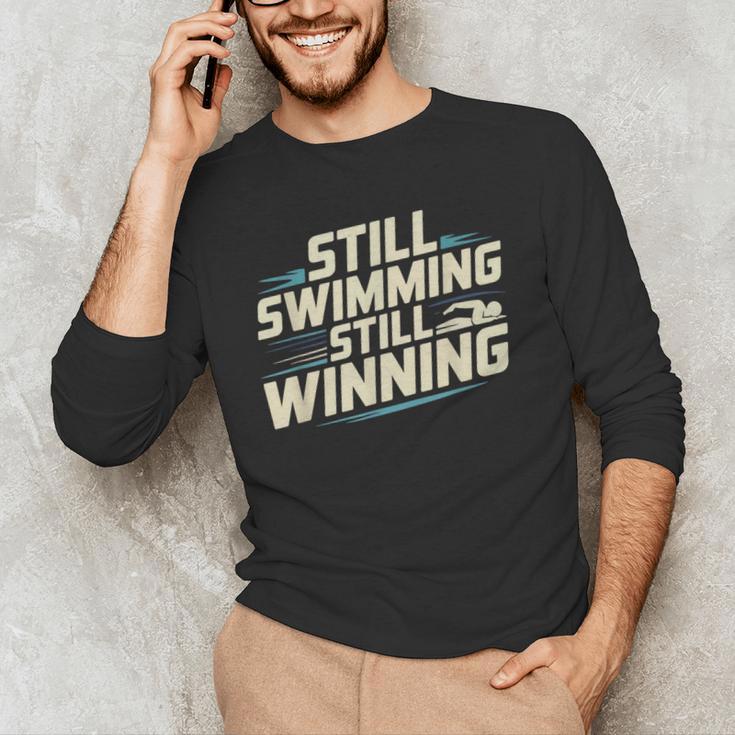 Masters Swimmer Still Swimming Competing Winning Adult Men's Long Sleeve T-Shirt Masters Swimmer Still Swimming Competing Winning Adult Men's Long Sleeve T-Shirt