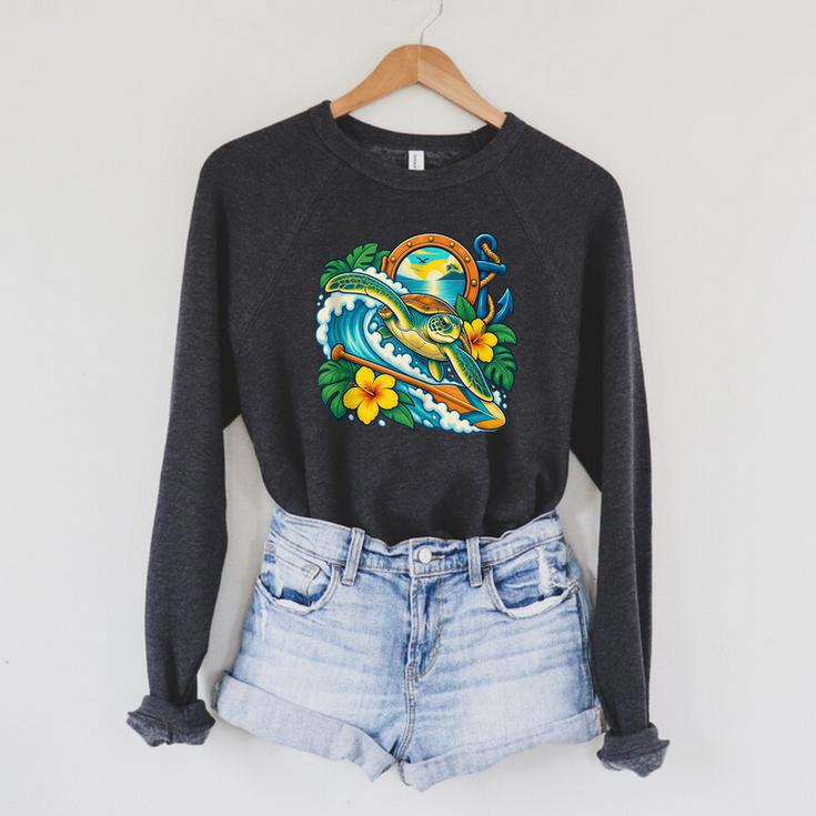 Green Sea Turtle Surfs Past a Canoe Paddle Sleeveless Raglan Sleeve Sweatshirt