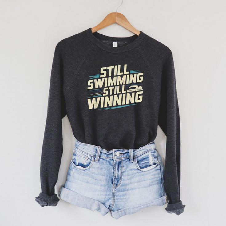 Masters Swimmer Still Swimming Competing Winning Adult Raglan Sleeve Sweatshirt