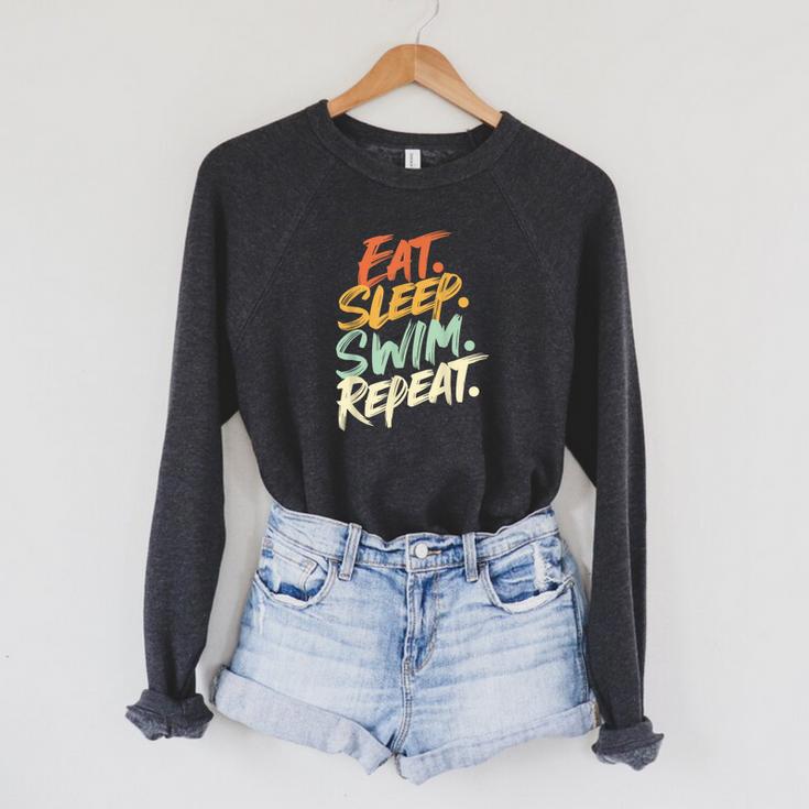 Swimmer Eat Sleep Swim Repeat I Swimming Raglan Sleeve Sweatshirt Swimmer Eat Sleep Swim Repeat I Swimming Raglan Sleeve Sweatshirt